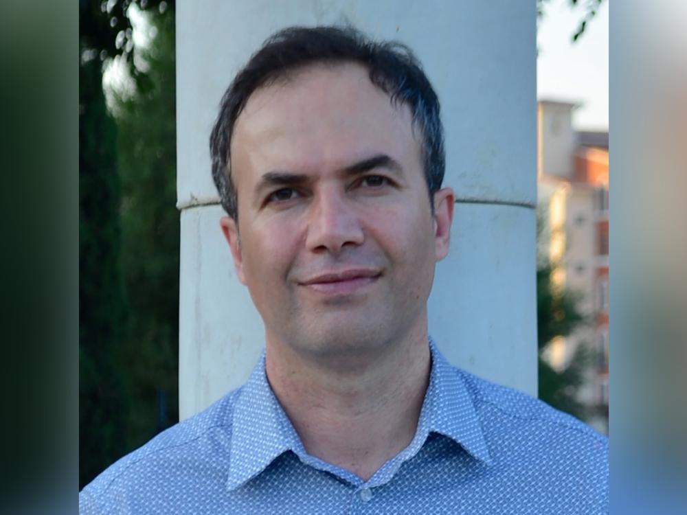 Headshot of Rahman Azari