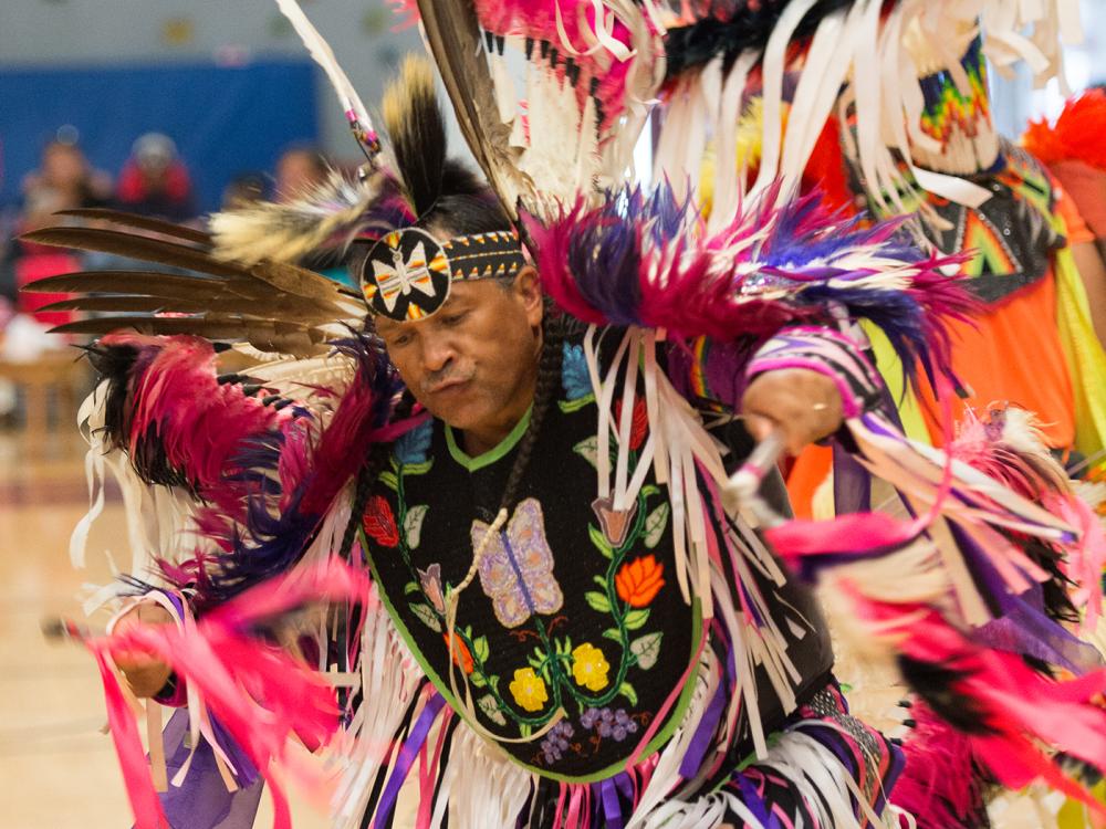 Powwow dancer in Native American regalia