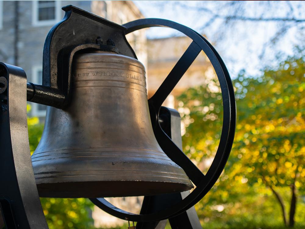 A bell is pictured on a sunny day.