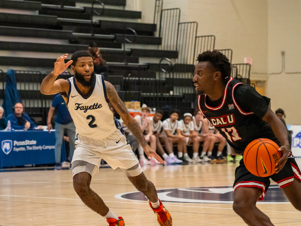 Dasilas Jones defends against an opponent during a home game.