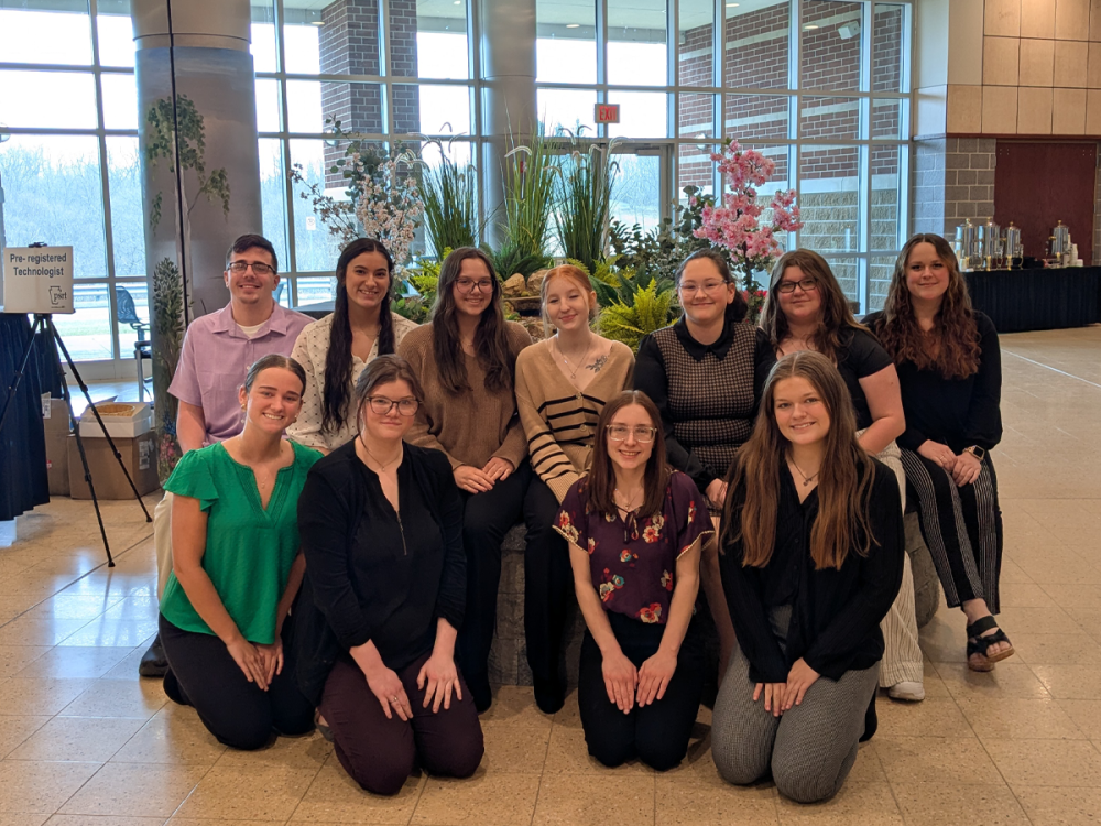 Group of Penn State New Kensington radiological science students pose indoors at the 2025 PSRT spring conference, where they attended lectures and student competitions.